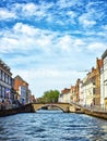 Water canal in Bruges, Belgium showing the bridges to which the city ows its name