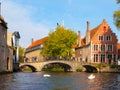 Water canal with old bridge and medieval houses at Begijnhof, Bruges, Belgium Royalty Free Stock Photo