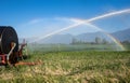 Water cannon machine watering corn fields Royalty Free Stock Photo