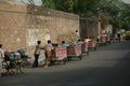 Water cart workers on their way to work