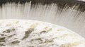 water cascade streaming down a lasher, cool white balance, concept for water saving, conservation, keeping water clean Royalty Free Stock Photo