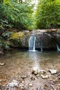 Water cascade on Ulu-Uzen river in Haphal Gorge Royalty Free Stock Photo