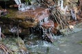 Water cascading over flat stone