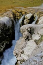 Water cascading over rocks in a creek near Arsiero, Italy Royalty Free Stock Photo