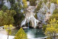 Water cascading over rocks into a natural pool at Turner Falls, beautiful landscape in Oklahoma. Royalty Free Stock Photo