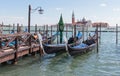 Water channels of Venice city. Parking gondolas near St. Mark`s Square on Grand Canal in Venice, Italy. Royalty Free Stock Photo