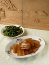 Water chestnut cake and fried choy sum Royalty Free Stock Photo