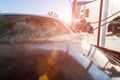 Water clean auto car on carwash hand service. Vehicle wash from soap, foam on cleaner station. Care with pressure wax. Royalty Free Stock Photo