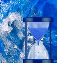 water clock on sea wave background close-up Royalty Free Stock Photo