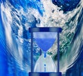 water clock on sea wave background close-up Royalty Free Stock Photo
