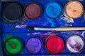 Water colours with brush Royalty Free Stock Photo