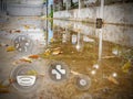 Water on concrete road or street due to lthe rain or flooding with icons of its consequences