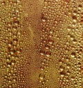 Water Condensation on Yellow Surface