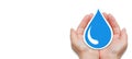 Water conservation and safe drinking water concept. Human hands holding blue water drop Royalty Free Stock Photo