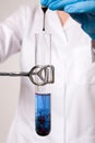 Water contamination test, tube witb blue liquid Royalty Free Stock Photo