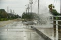 Water crashing over the street