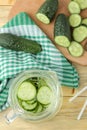 Water with cucumber. Refreshing diet water with cucumber and mint in a glass beaker on a wooden background. detox drink concept. s Royalty Free Stock Photo