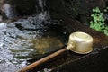Japanese water dipper for cleaning before entry to the temple Royalty Free Stock Photo