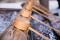 Water dipper for hand cleanse in Japanese temple Royalty Free Stock Photo