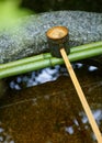 Water dipper on a stone basin at Koto-in Temple in Kyoto Royalty Free Stock Photo