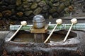 Water dippers in front of shinto shrine Royalty Free Stock Photo