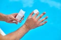 Preparation for swimming pool disinfection with chlorine tablets Royalty Free Stock Photo