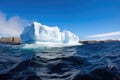water disturbance caused by a large iceberg collapsing into the sea Royalty Free Stock Photo