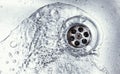 Water drain down on stainless steel kitchen sink Royalty Free Stock Photo