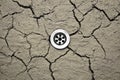 Water drain in dry soil Royalty Free Stock Photo