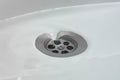 Water drains whirly in the wash sink in the bathroom Royalty Free Stock Photo