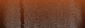 Water drop on black,orange background. Water drop gradient on black texture. Royalty Free Stock Photo