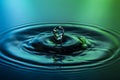 Water drop on blue green background Royalty Free Stock Photo
