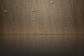 Water drop on the brown wall with reflction Royalty Free Stock Photo