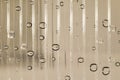 Water drop close-up on the plastic transparent surface rough striped, Royalty Free Stock Photo