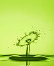 Water Drop Collisions Macro Photography with green background