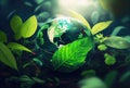 Water drop in earth shape with green leaves in the jungle. World Environment Day and World Water Day concept. Environmental Royalty Free Stock Photo