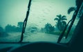 Water drop on glass mirror. Wiper on a wet windshield