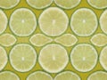 Water Drop With Green Lemon Slices Pattern Background.
