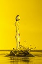 Water-drop,macro,yellow background Royalty Free Stock Photo