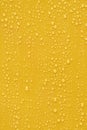 Water drop on orange background. Royalty Free Stock Photo