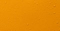 Water drop orange background Royalty Free Stock Photo