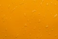 Water drop orange background Royalty Free Stock Photo