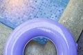 Water drop on part of purple ring pool Royalty Free Stock Photo