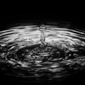 Water droplet with ripple splash Royalty Free Stock Photo