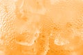 Water drop soda ice baking background fresh cool ice orange texture, selective focus Royalty Free Stock Photo