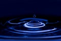 Water drop splash with blue colored Royalty Free Stock Photo