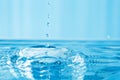 Water splash blue colored Royalty Free Stock Photo