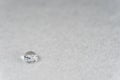 water drop on top of white fabric sheet Royalty Free Stock Photo