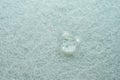 water drop on top of white fabric sheet Royalty Free Stock Photo