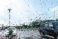 water droplets with abstract blur background as viewed from car window on a rainy day. Royalty Free Stock Photo